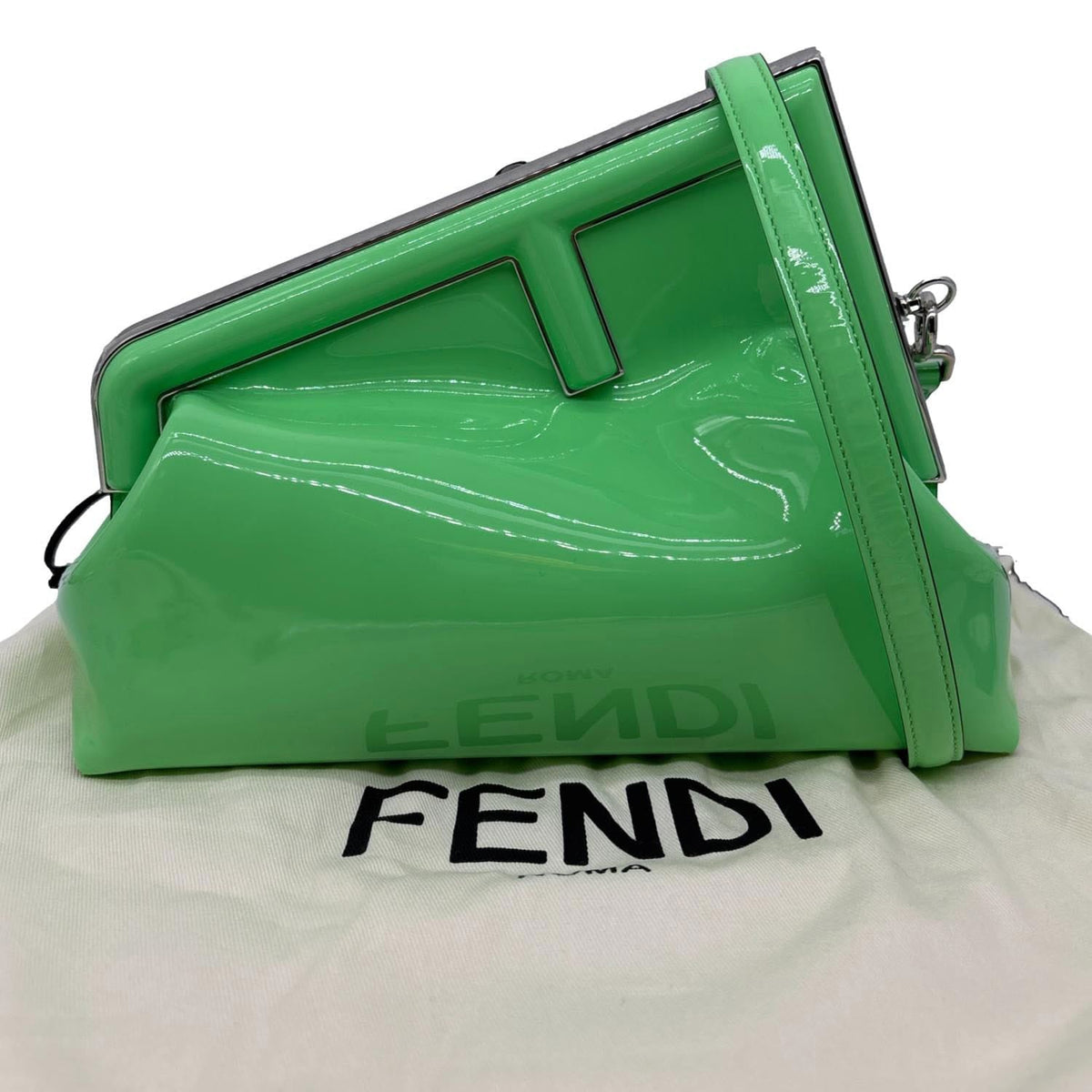 The oversized F clasp on the Fendi First clutch