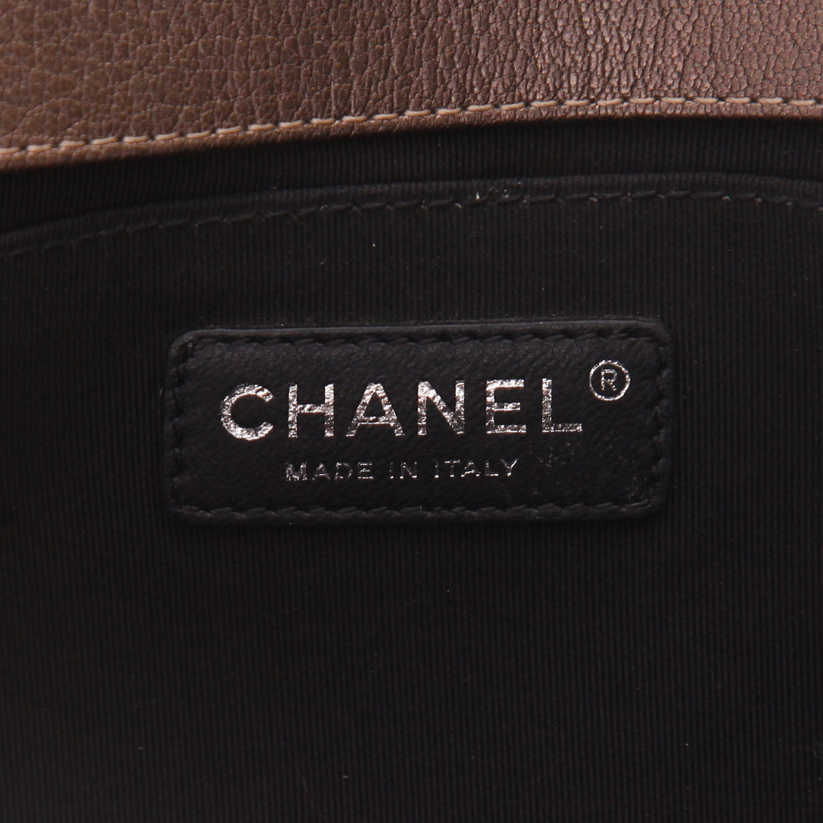 Boy shoulder bag in golden brown quilted leather