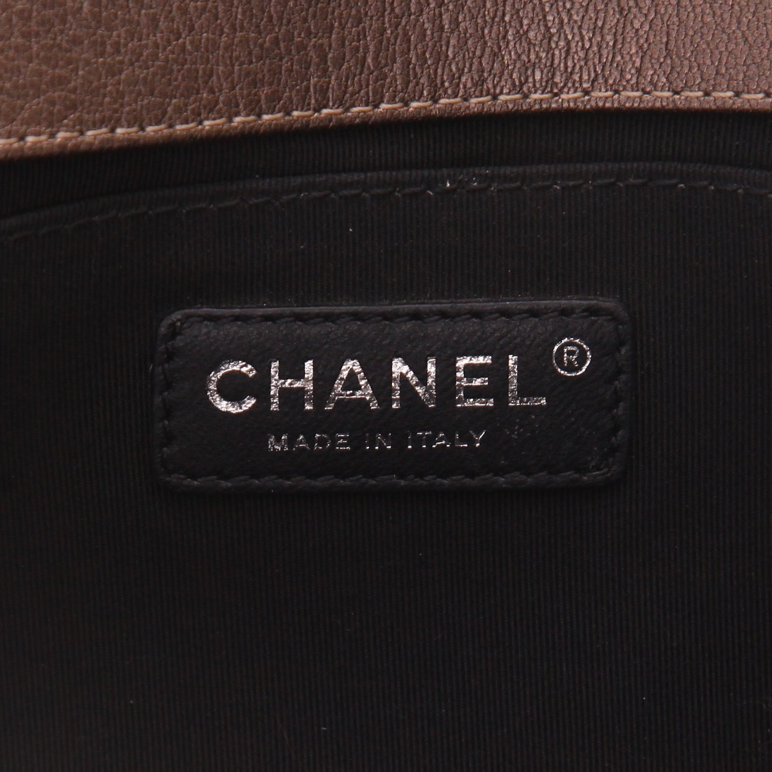 Boy shoulder bag in golden brown quilted leather